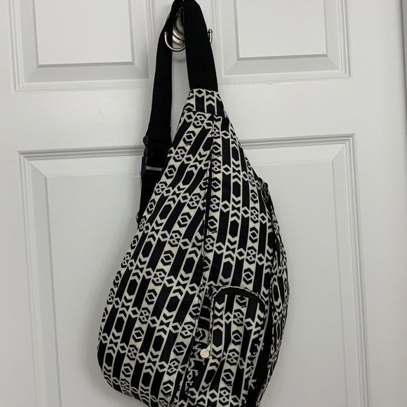Initials Sling Backpack NWOT black & white with adjustable wide strap - Picture 1 of 9